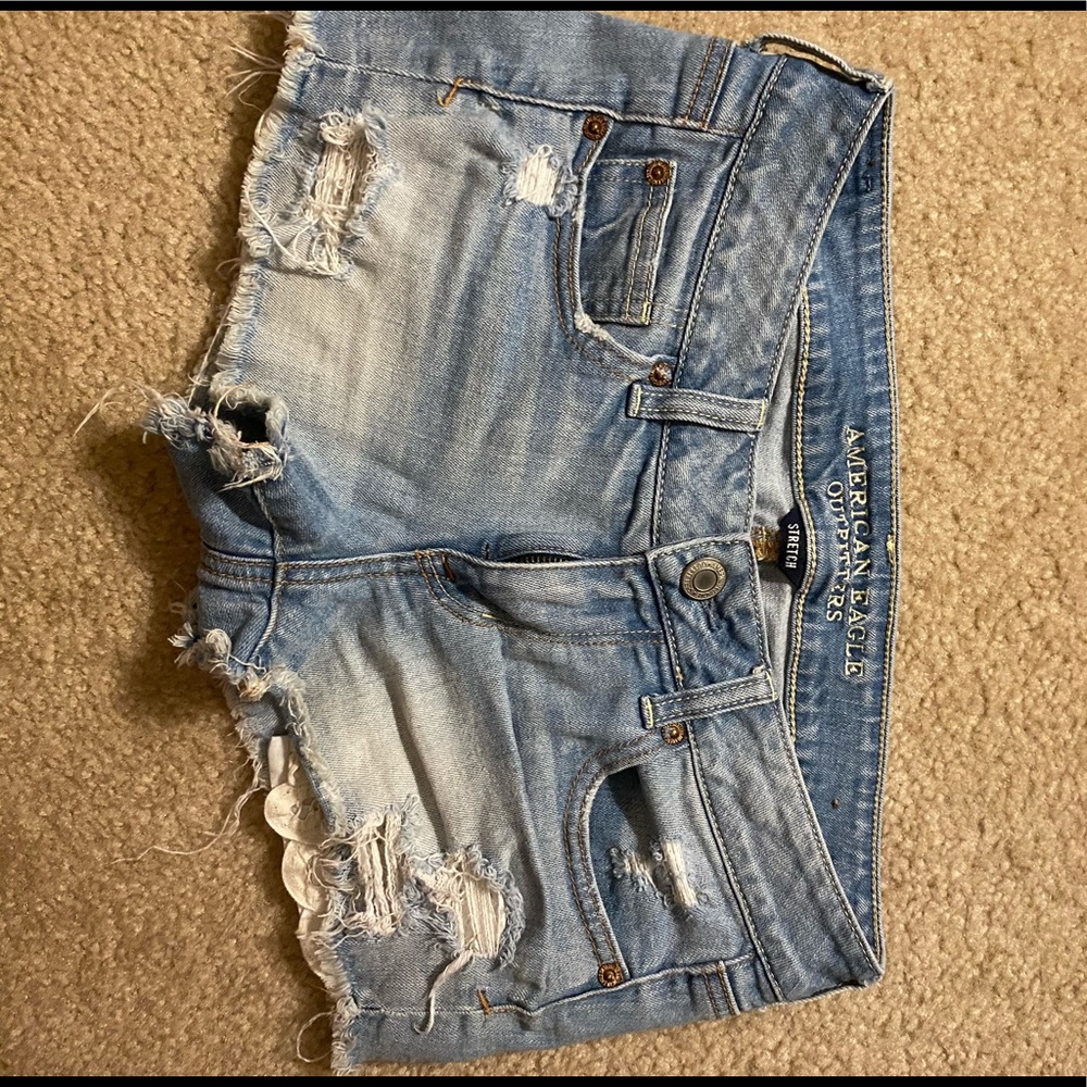 Destroyed Lightwash American Eagle Shortie Shorts